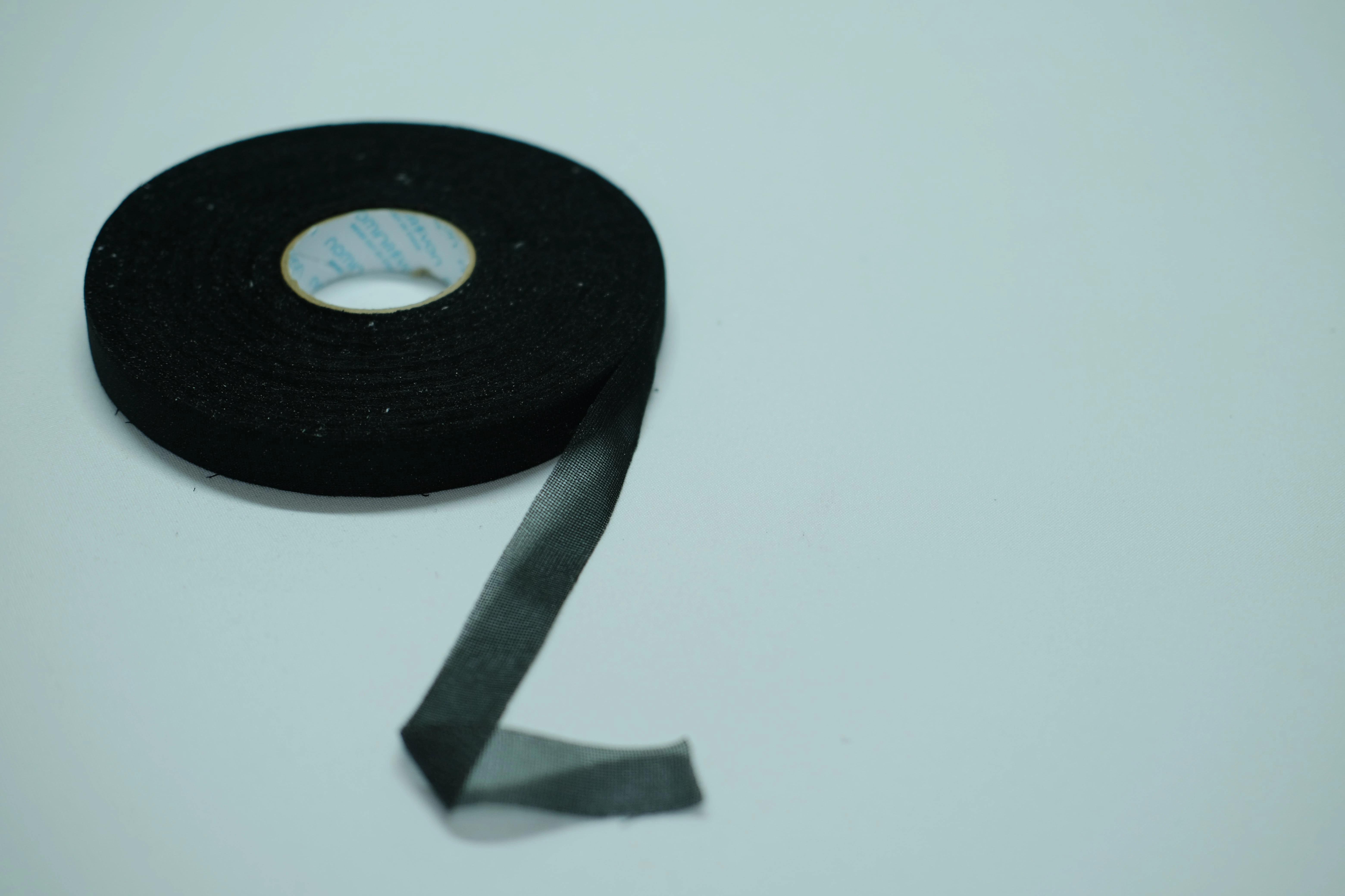 PES WEFT INSERTED KNIT TAPE